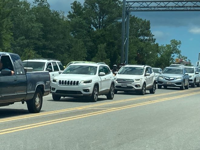 Drivers sit in traffic on U.S. 421 near Leland around 1 p.m. on Saturday, June 29, 2024. Several roads in Brunswick and New Hanover counties remain closed due to an ongoing hazmat situation.